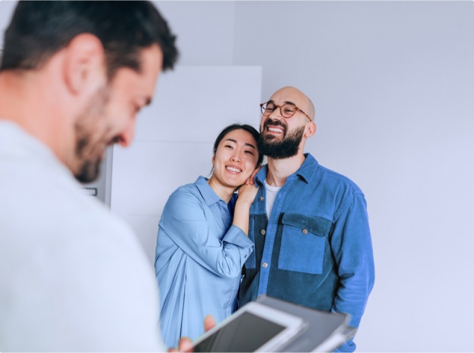 Couple talking to realestate agent