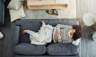 woman lying on the sofa